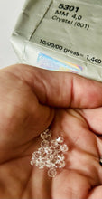 Load image into Gallery viewer, 24 Genuine Swarovski Crystal 4mm Bicone Beads Crystal Clear #5301 Austrian NOS
